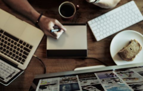 aerial-view-man-working-computer
